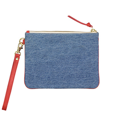 pochette cuir et empiècement jean et clou 